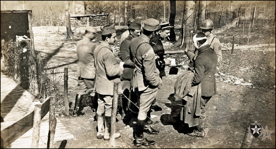 French Officers quizzing a German prisoner at P.C. Moscou, France (4th Brigade Hq., 2nd Division) April 5, 1918.