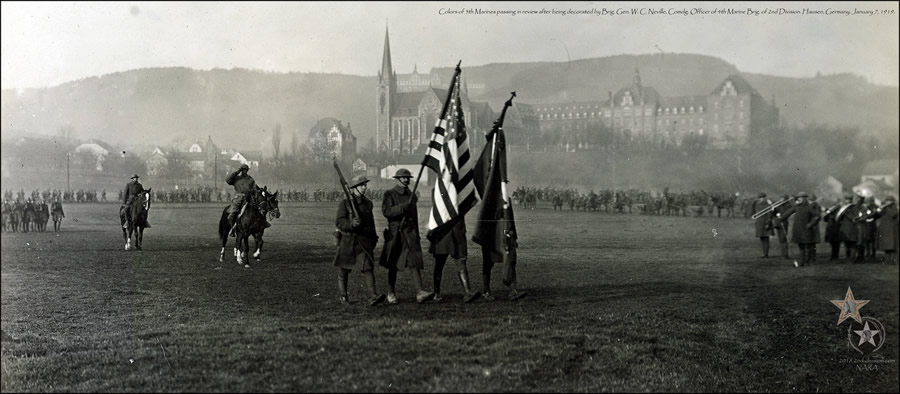 Colors of 5th Marines passing in review after being decorated by Brig. Gen. W. C. Neville. Hausen, Germany. January 7, 1919.