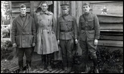 2nd Division Quartermaster, Lt. Col. F. C. Miller, Q.M.C., Div. Q.M. 2nd Div. and several of his assistants. La Cheppe, Marne, France October, 1918.