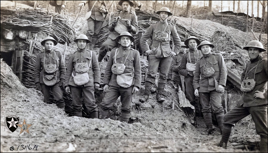 Marines come out of dugout and pose for photographer. Toulon Sector, France, March 22, 1918.