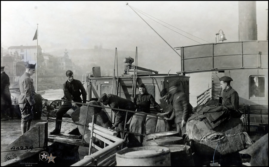 Cpl. E. B. Donnelly, 6th Marines, learning pilot's duties. American patrol boats, Rhine River, Neuwied to Remagen, Germany.