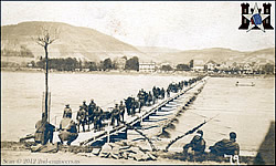 Pontoon bridge complete at Honningen with the light Artillery crossing over.